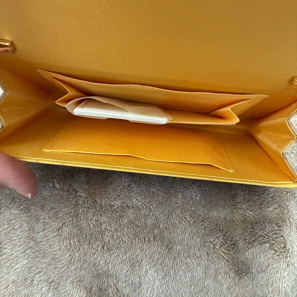 Mikimoto Cream Clutch with Gold Accents